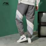 리닝 스포츠 바지 남성 스포츠 패션 컬러 클래싱 바지 트렌드 남성 바지 대형 드로 스트링 짠 스포츠 바지의 그림