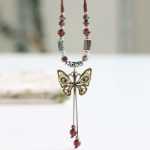 귀페이 나비 에스닉 스타일 세라믹 긴 점퍼 체인의 그림