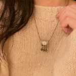 세라믹 나비 벨 펜던트 목걸이의 그림