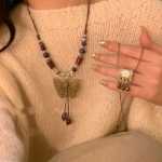 세라믹 나비 벨 펜던트 목걸이의 그림