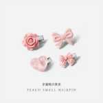 십대 핑크 복숭아 헤어 클립의 그림