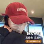 큰 머리야구 모자의 그림