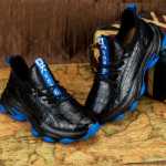 악어 가죽 남성 신발의 그림