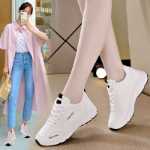 숙녀 가죽 운동화의 그림