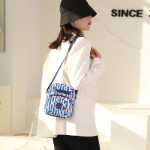 나일론 캔버스 크로스 바디 가방의 그림