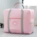 임산부 옷 가방 아기 용품의 그림