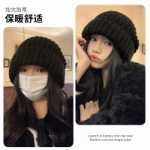 두꺼운 양모 모자의 그림