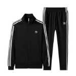 봄과 가을 클로버 스포츠 및 레저 정장 남성 및 여성 느슨한 달리기 피트니스 3 바 재킷 바지 2 피스 세트의 그림