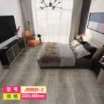 공장 도매 주택 리모델링 PVC 바닥재 가정용 대리석 타일 스티커 석재 플라스틱 바닥재 자체 접착 SPC 바닥재의 그림