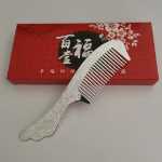 합금 은도금 빗 실버 이온 건강 관리 빗 건강 실버 빗 공작 꼬리 실버 빗 미아오 실버 주얼리는 선물을 판매합니다.의 그림