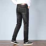 새로운 남성용 스트레치 슬림 청바지 남성용 작은 발 청바지 청소년 트렌드 남성용 청바지의 그림