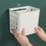 벽걸이 형 중공 보관 바구니 세탁 용품 분류 보관 바구니 가정용 욕실 잡화 보관 걸이 세탁 바구니의 그림