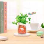 크리에이티브 사무실 화분 긴 잔디 머리 인형 멋진 표현 DIY 유리 병 음이온 미니 심기 선물의 그림