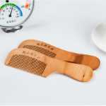 공장 직접 대형 나무 빗 마구간 제품 천연 건강 관리 복숭아 나무 빗 정전기 방지 건강 관리 복숭아 나무 빗의 그림