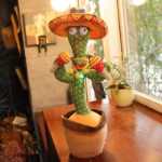 크로스 보더 발광 업그레이드 된 국가 언어 전기 장난감 인형 댄스 선인장 옷 모양 멀티 옵션 배우기의 그림