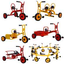 버킷이 달린 유치원 세발자전거의 그림