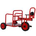 버킷이 달린 유치원 세발자전거의 그림