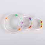 도매 아기 장난감 투명 링 링 아기 손 딸랑이 아기 조기 학습 장난감의 그림