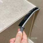 욕실 타일 틈새 브러시의 그림