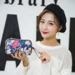 동전  휴대 전화 가방의 그림