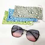 안경 선글라스  휴대 전화 가방의 그림