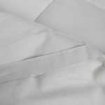 호텔 비앤비 침구 보호 패드의 그림