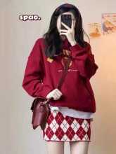 벨벳 프린트 스웨터의 그림